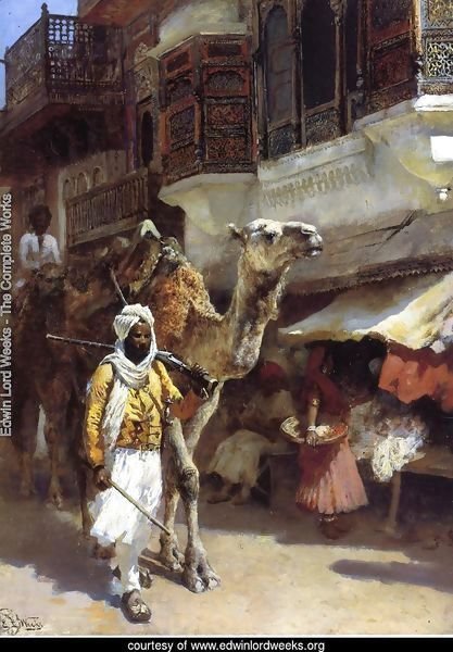 Man Leading A Camel